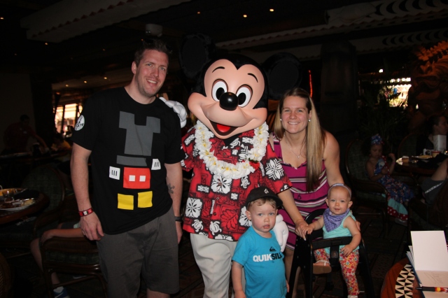 A family photo with Mickey Mouse
